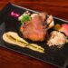 台中商業餐敘 燉、炸、烤經三道工序的德國豬腳 外皮酥脆、內部保有肉汁